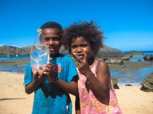 We're not sure if this girl knew which way her fingers were facing. Her brother just caught Nemo.