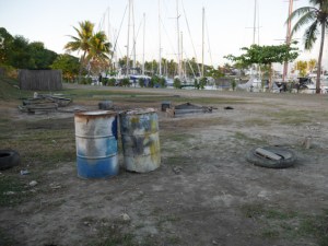 Rubbish, grot, mess or chaos is always round he corner. I love it that to get to Octopus Resort you have to pass through the village cemetery and pigs.