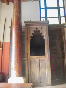 The confession booth is a broom cupboard.